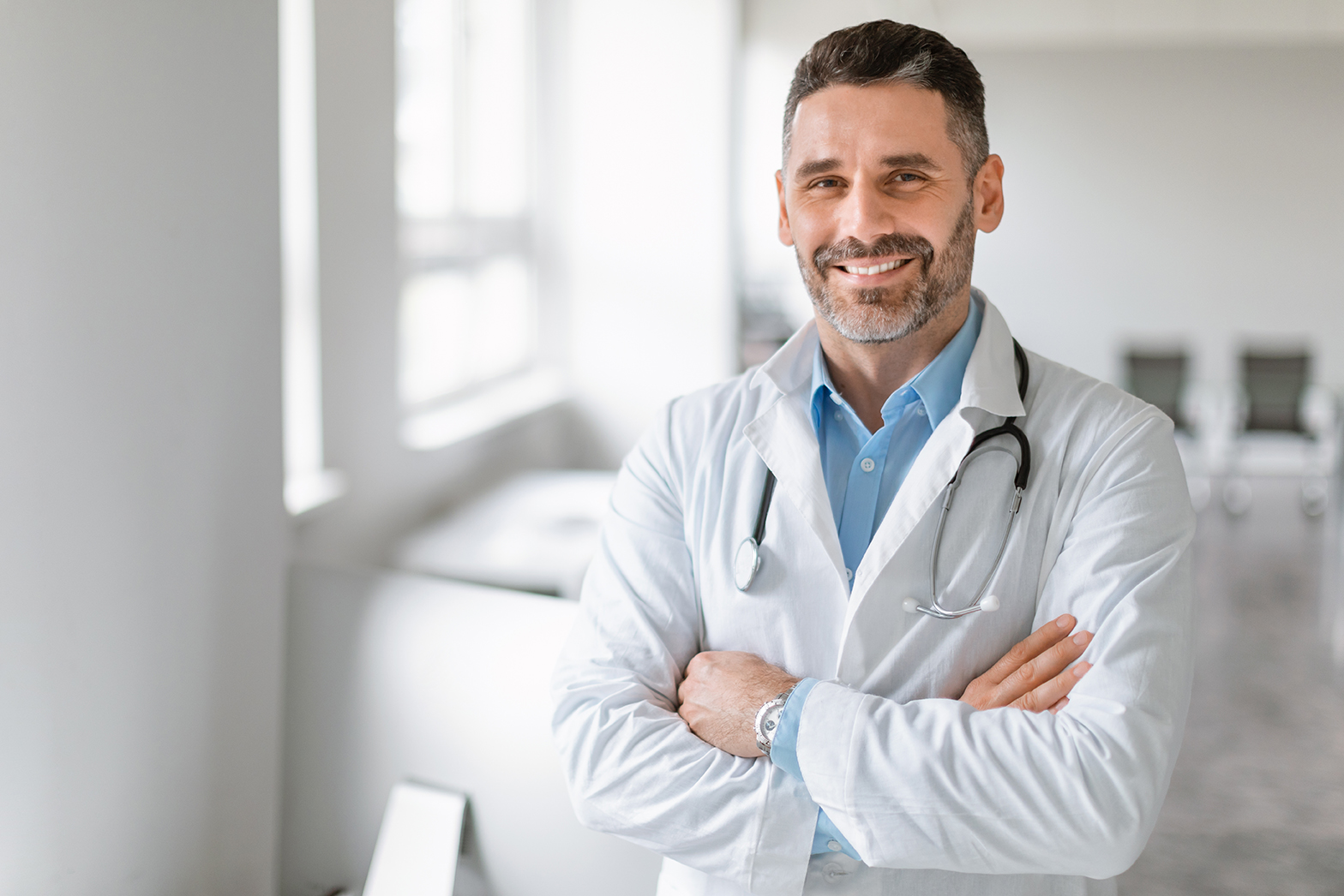 Portrait,Of,Friendly,Middle,Aged,European,Male,Doctor,In,Workwear